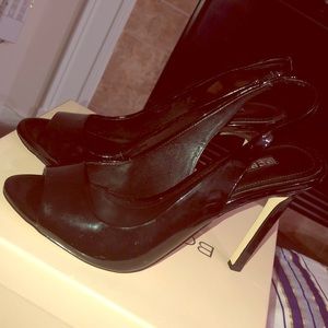 Bcbg, work or party black pumps with back strap.